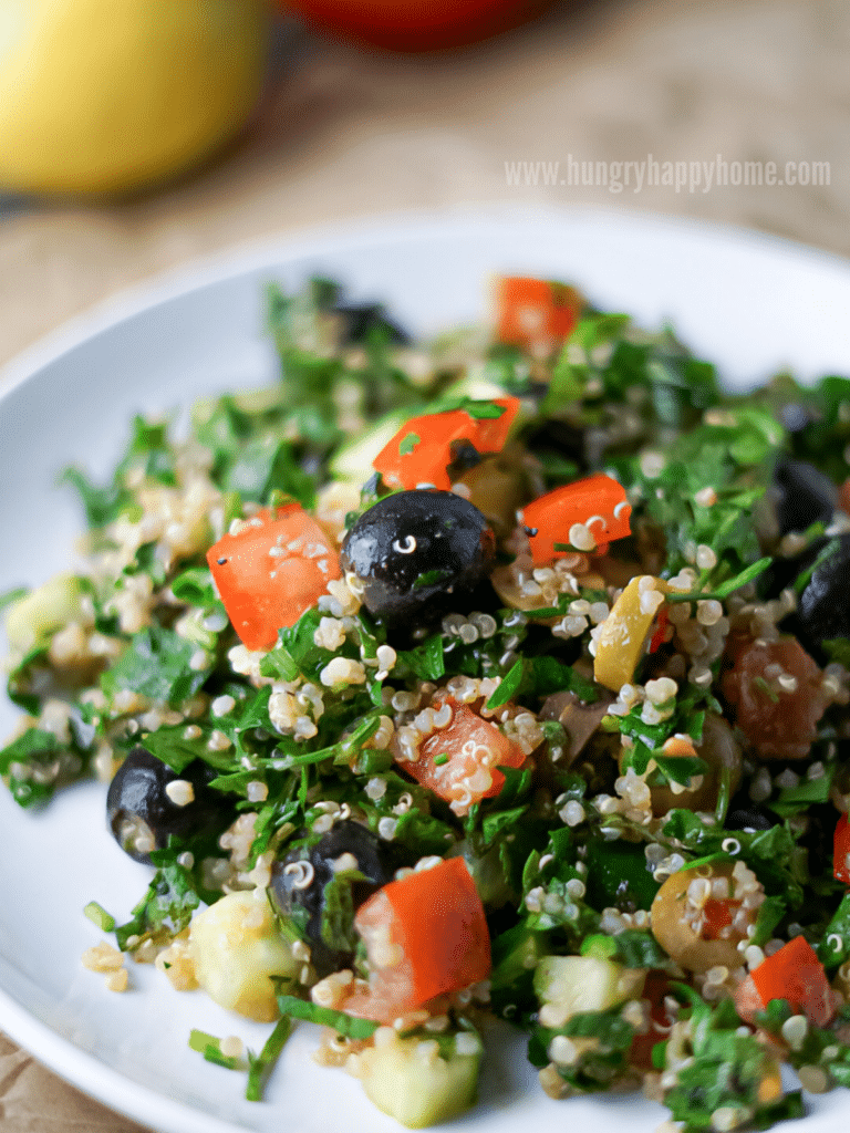 image of quinoa tabbouleh on a white plate