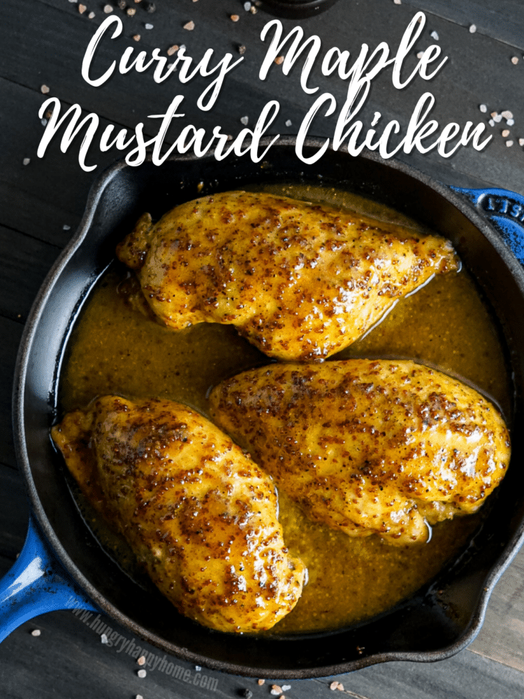 Curry Maple Mustard Chicken in a cast iron skillet.