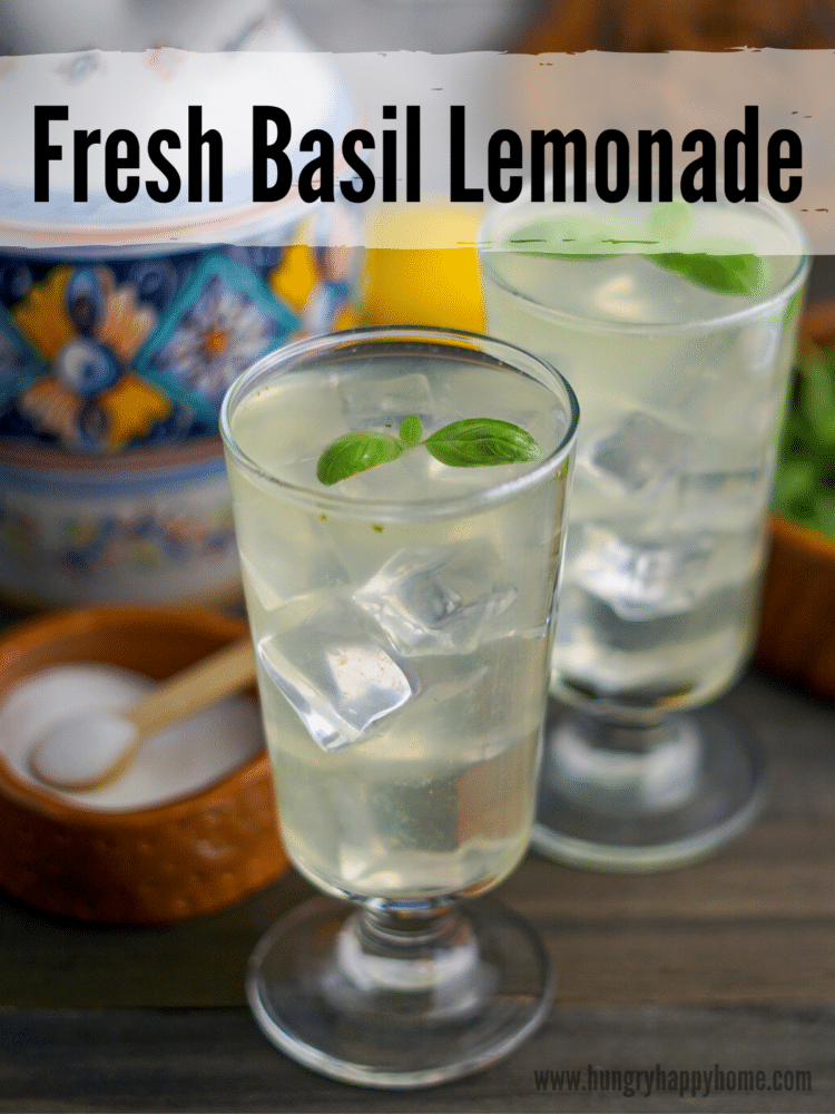 Iced Basil Lemonade in glasses on a wooden table.