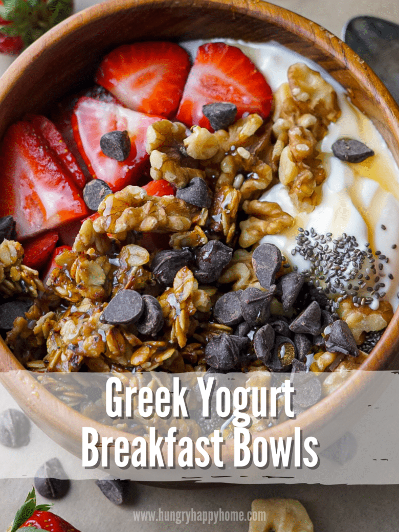Wooden bowl with Greek yogurt topped with sliced strawberries, granola, walnuts, chocolate chips and chia seeds drizzled with honey.