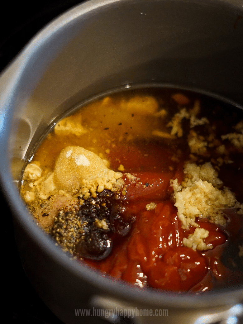 Process photo of the uncombined ingredients in a sauce pan on the stove.